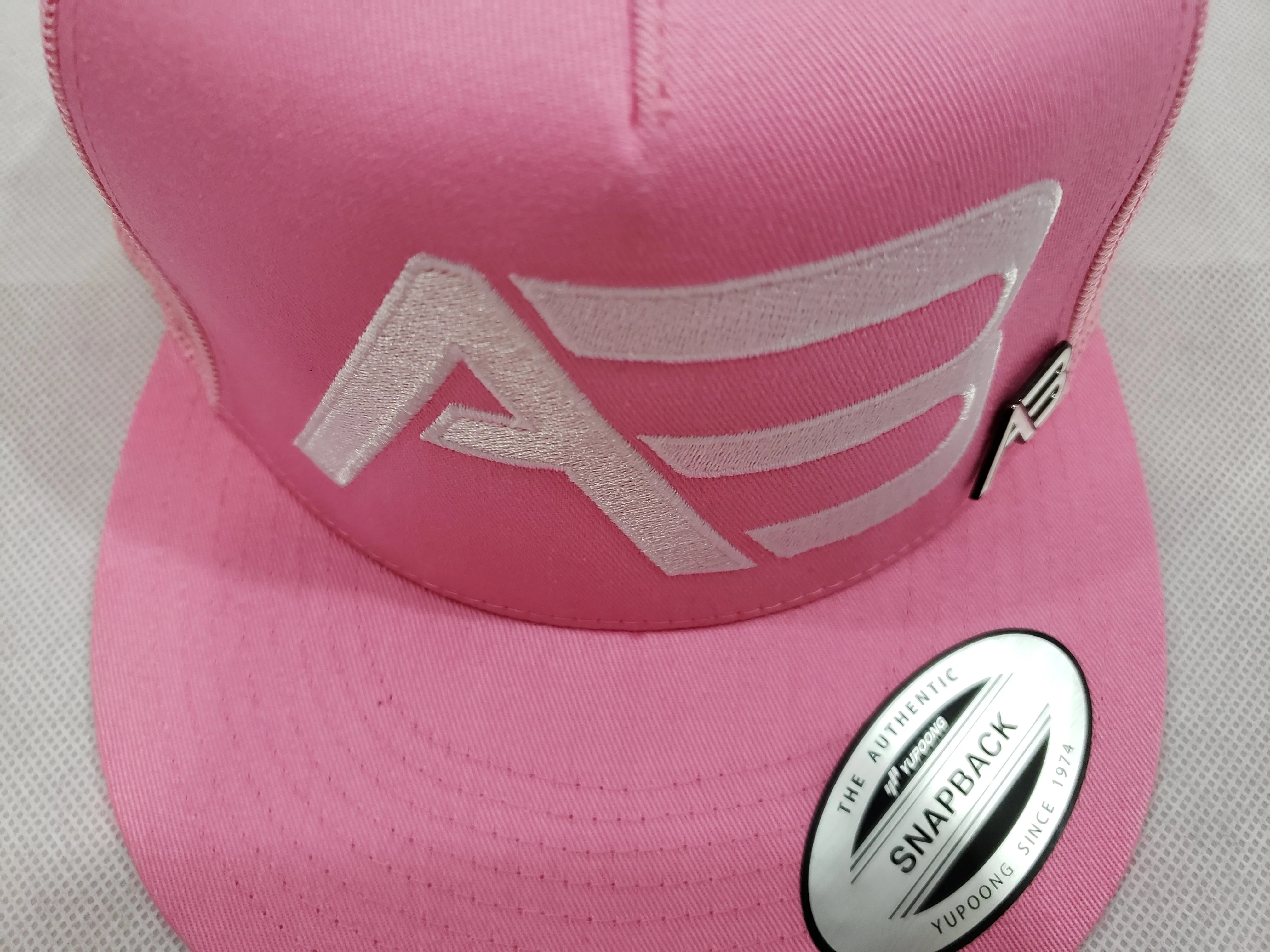 A&B PINK BLOSSOM FLAT BIB SNAPBACK W/PIN (Flat stitch)