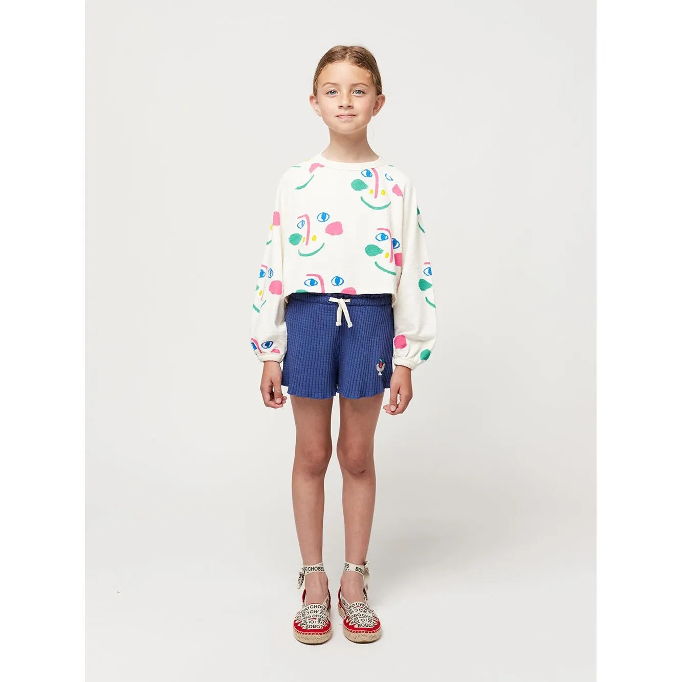 Smiling Mask All Over Raglan Sleeves Cropped Sweatshirt